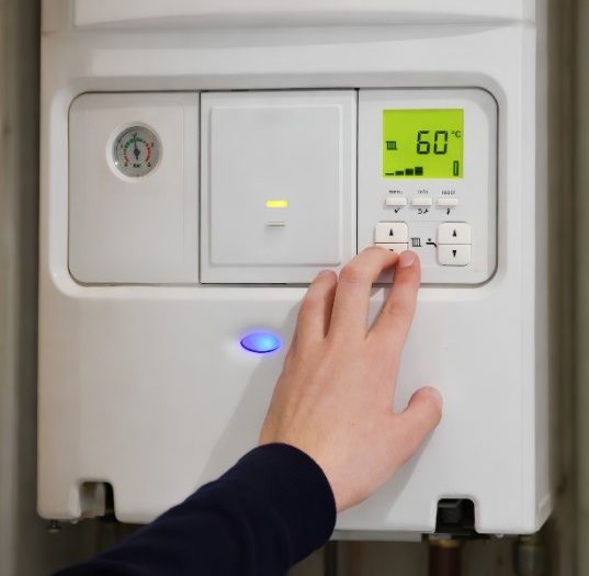 Adjusting an energy efficient boiler to improve home heating performance